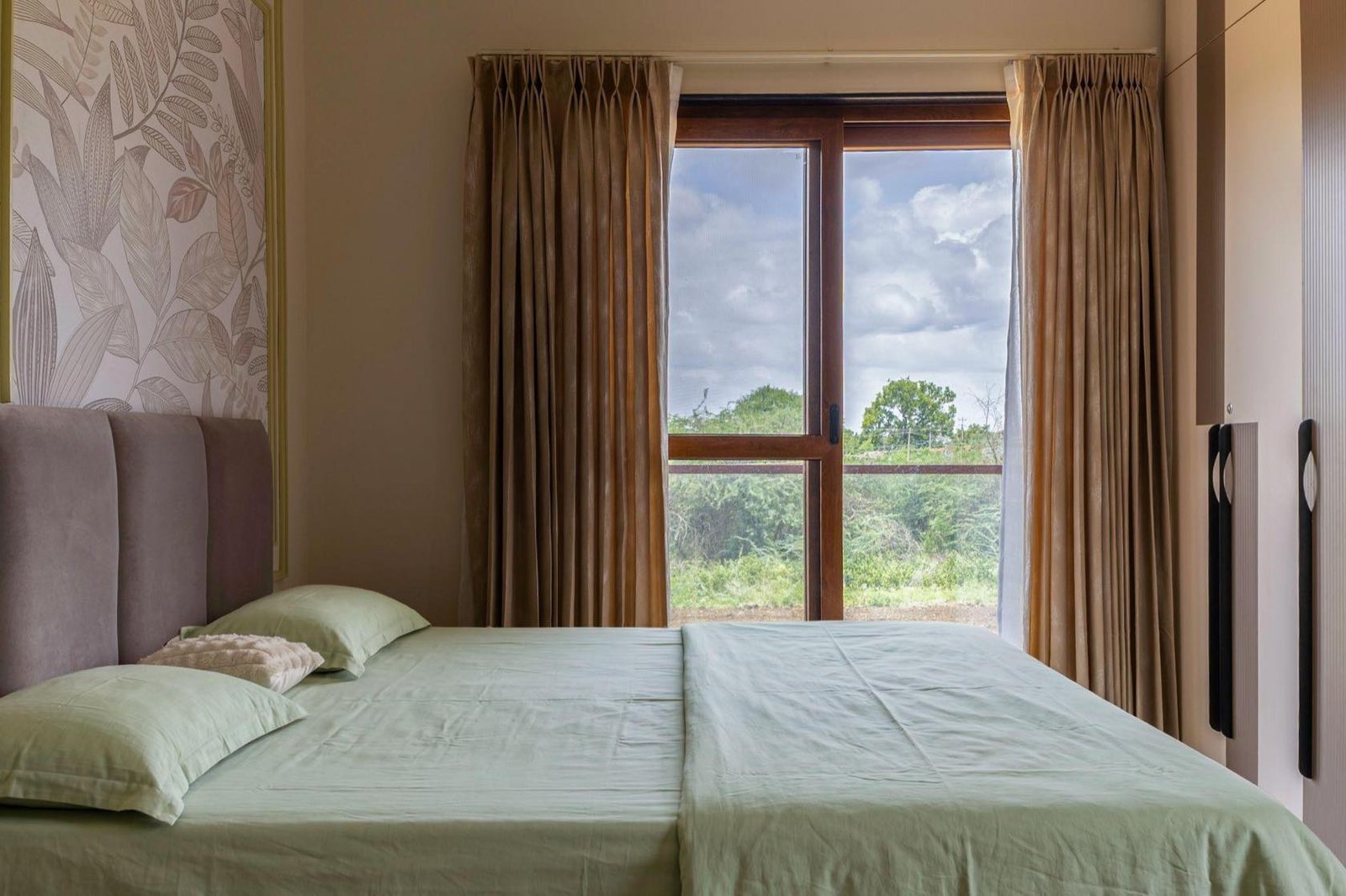 Bedroom window framing the view outside