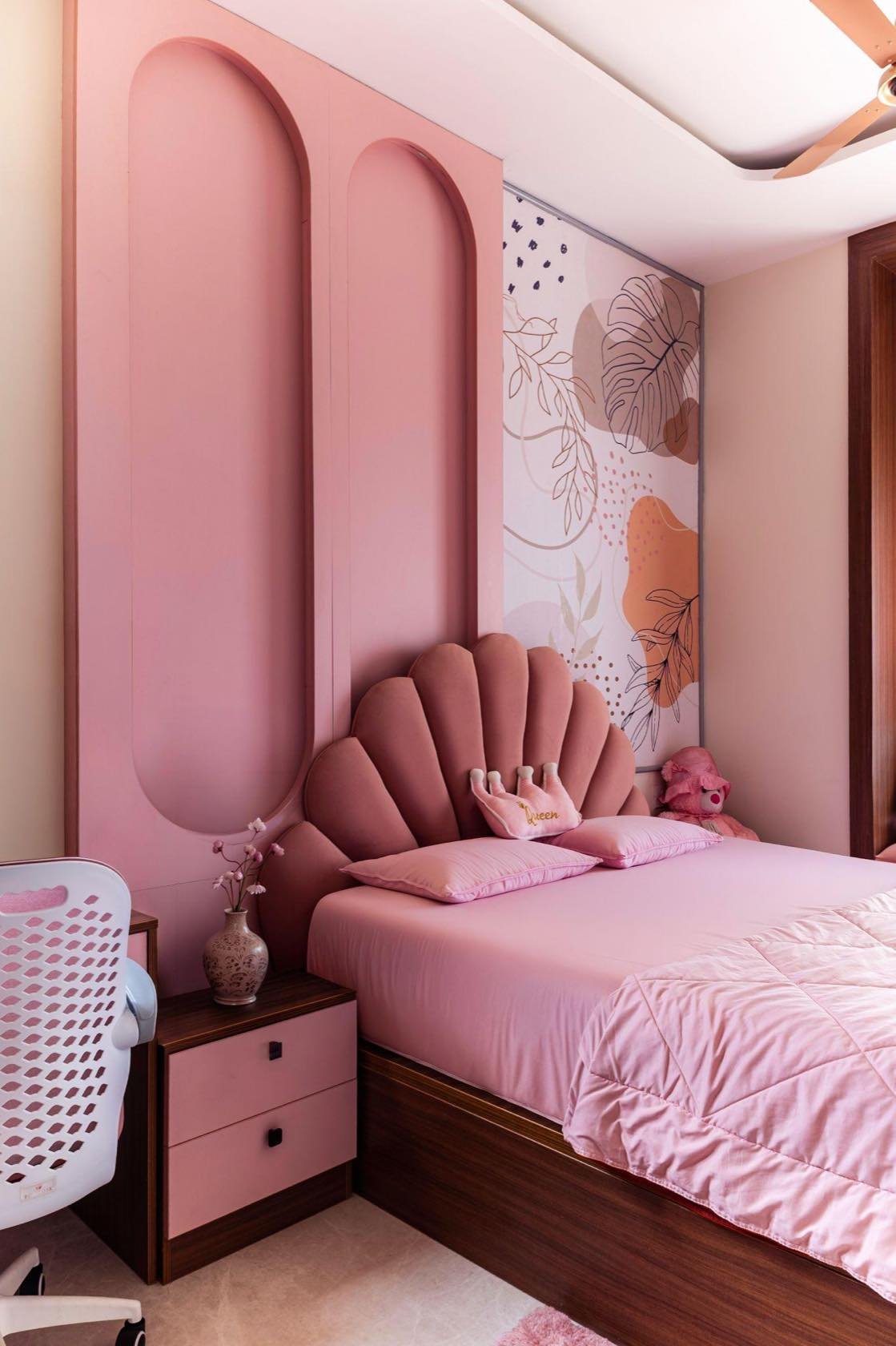 Children's bedroom with arched panelling and scalloped headboard