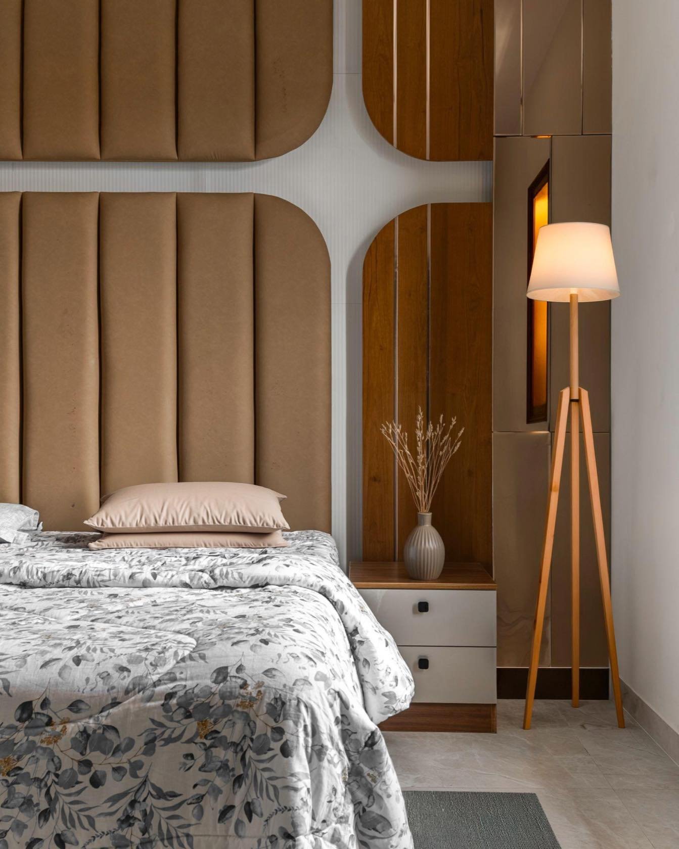 Master bedroom with fluted headboard and floor lamp