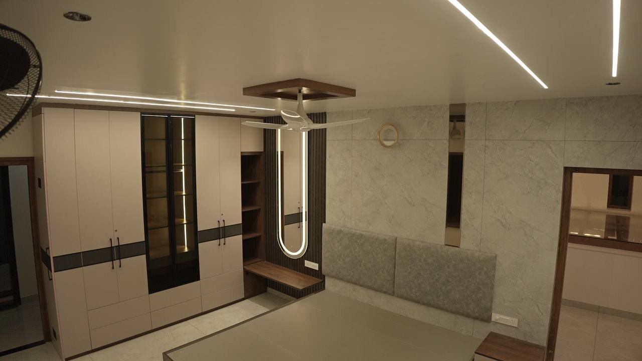 Master bedroom wardrobe wall with a backlit arch